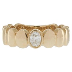 14K Yellow Gold Oval Pattern Ring with Oval Cut Diamond
