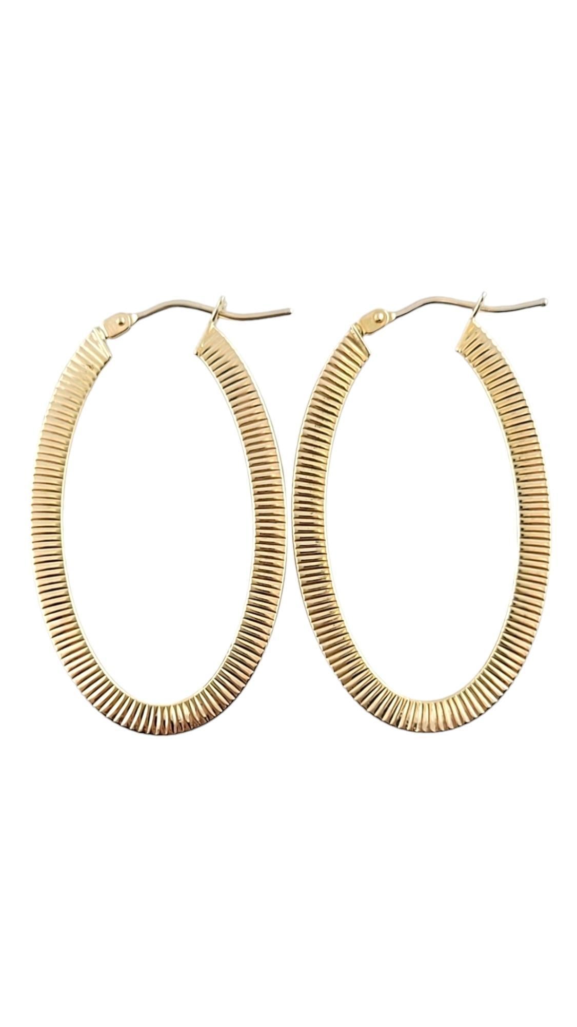 14K Yellow Gold Oval Ribbed Earrings #15857 For Sale