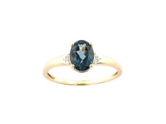 14K Yellow Gold Oval & Round Cut Blue Topaz and Diamond Accent Ring