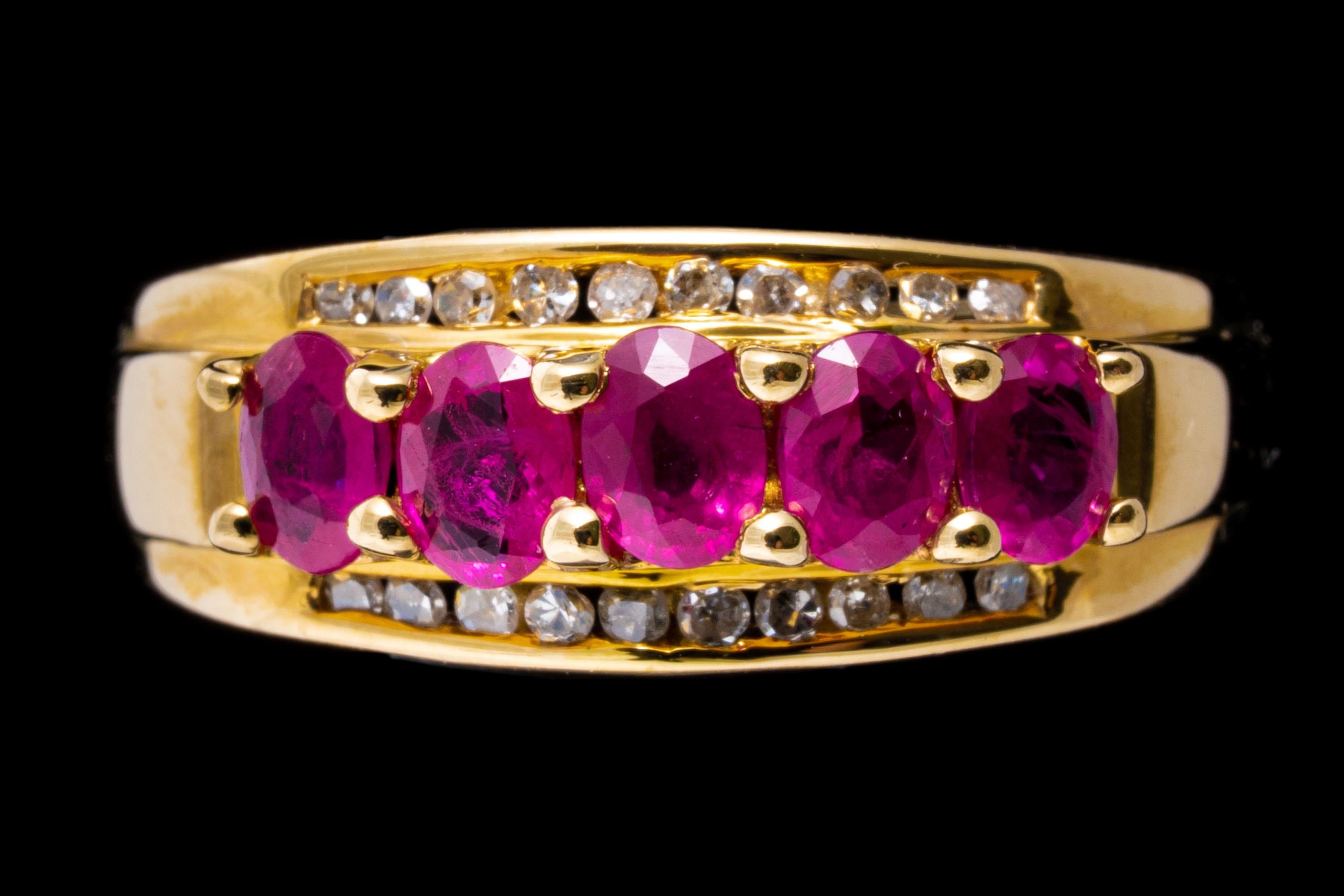14k yellow gold ring. This handsome yellow gold ring is a three row band style, set with a center row of oval faceted, reddish pink color rubies, approximately 0.80 TCW, prong set and flanked by a trim of round faceted diamonds, approximately 0.10