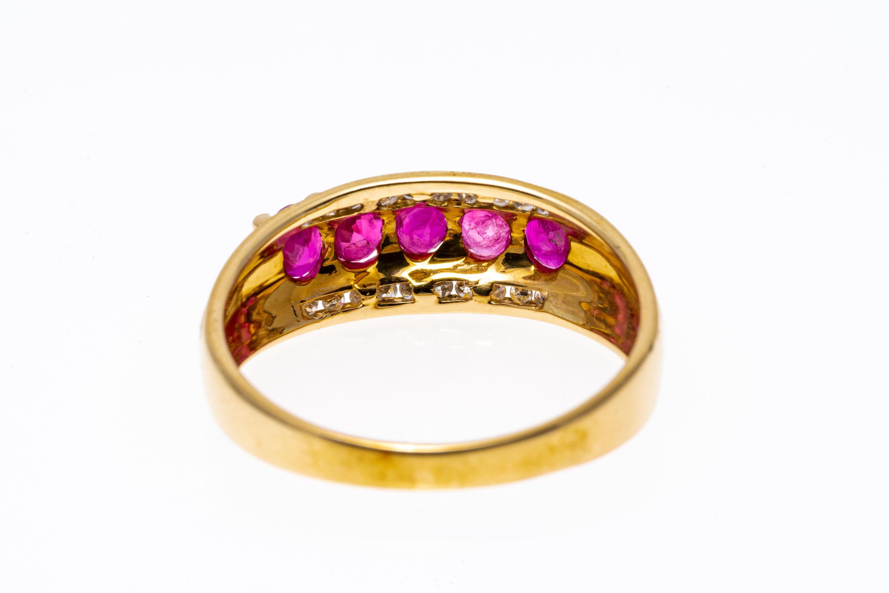 Contemporary 14k Yellow Gold Oval Ruby and Channel Diamond Band Ring For Sale