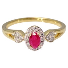 14K Yellow Gold Oval Ruby Halo Ring with Diamond Heart Accents