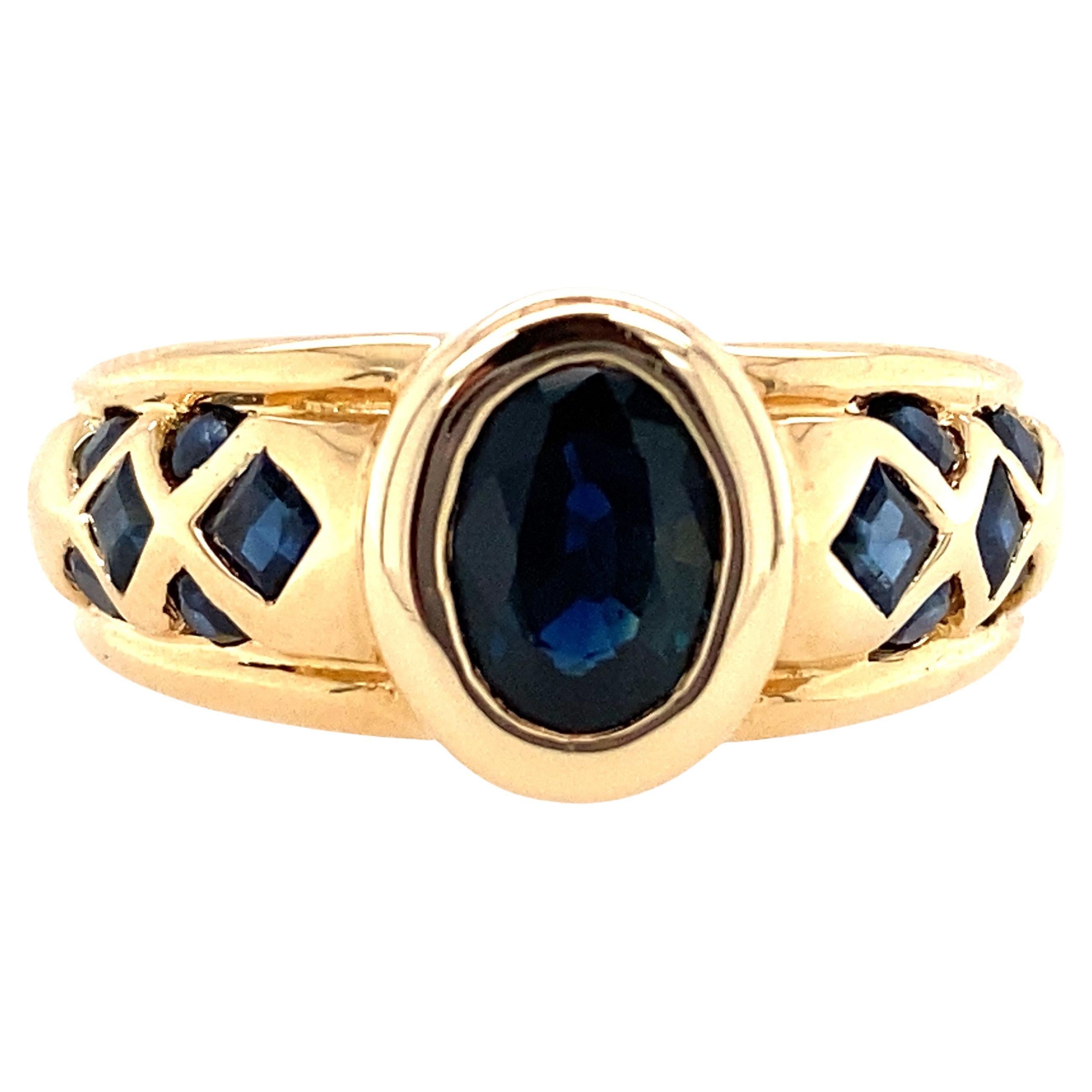14k Yellow Gold Oval Sapphire Bezel Set Ring For Sale