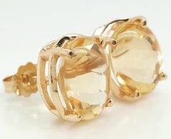 14 Karat Gelbgold Oval geformte facettierte Citrin-Ohrstecker mit Buff-Top