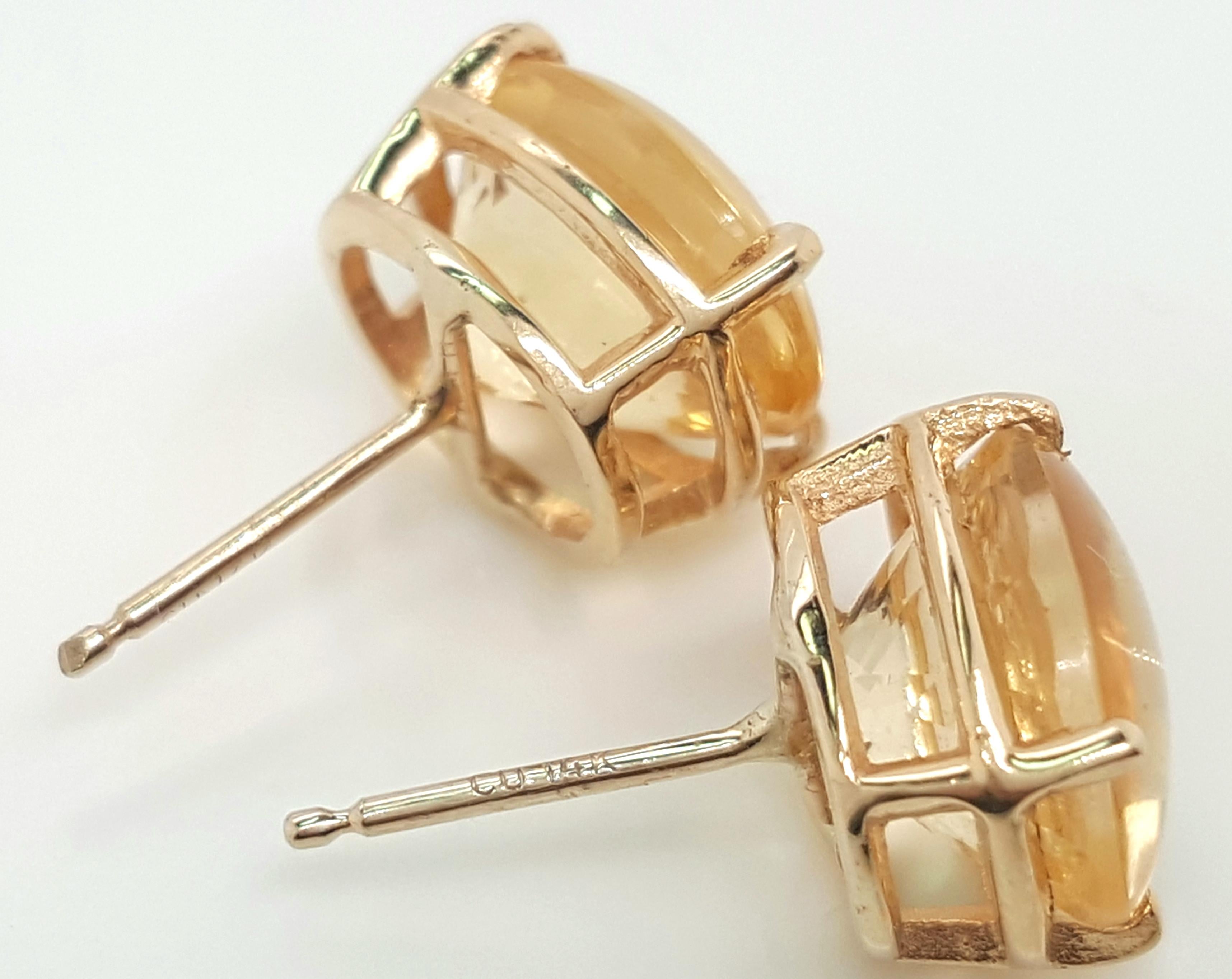 14 Karat Yellow Gold Oval Shaped Buff-Top Faceted Citrine Stud Earrings In Good Condition For Sale In Addison, TX