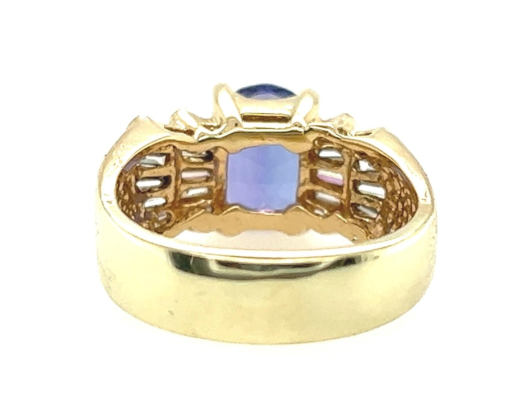 Oval Cut 14k Yellow Gold Oval Tanzanite and Baguette Diamond Ring