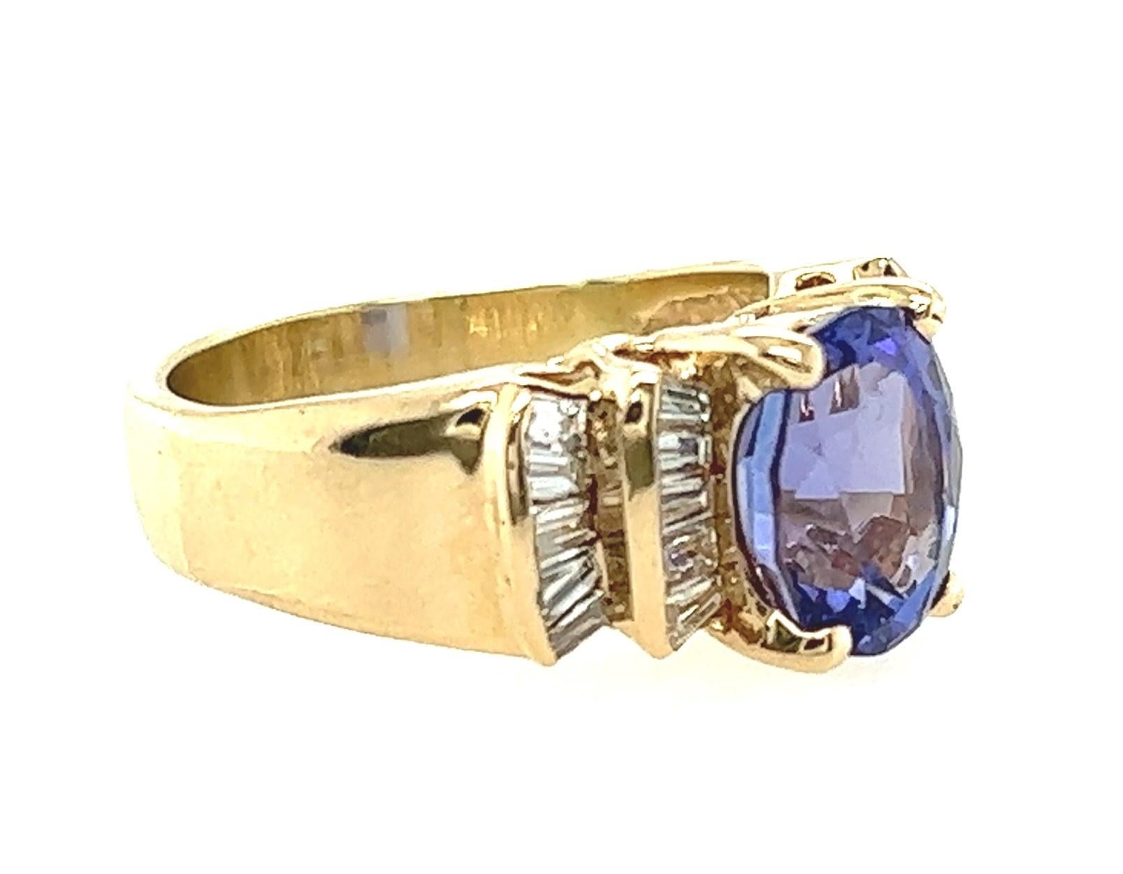 14k Yellow Gold Oval Tanzanite and Baguette Diamond Ring In Good Condition In Towson, MD