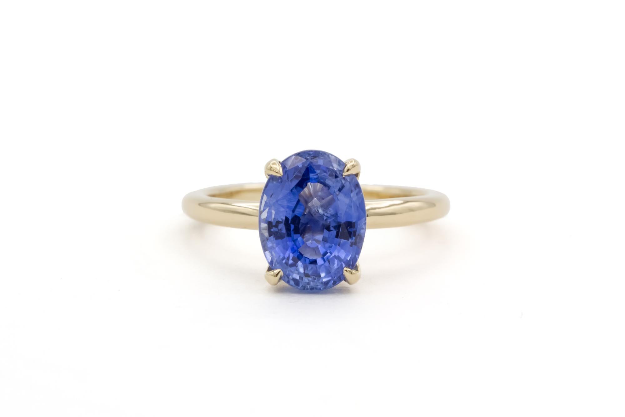 We are pleased to offer this 14k Yellow Gold & Oval Tanzanite Ladies Cocktail Fashion Solitaire Ring. This beautiful and fun ring features a 2.84ct oval cut tanzanite set in a 4 prong 14k yellow gold ring. The ring measures 10mm at the wides point