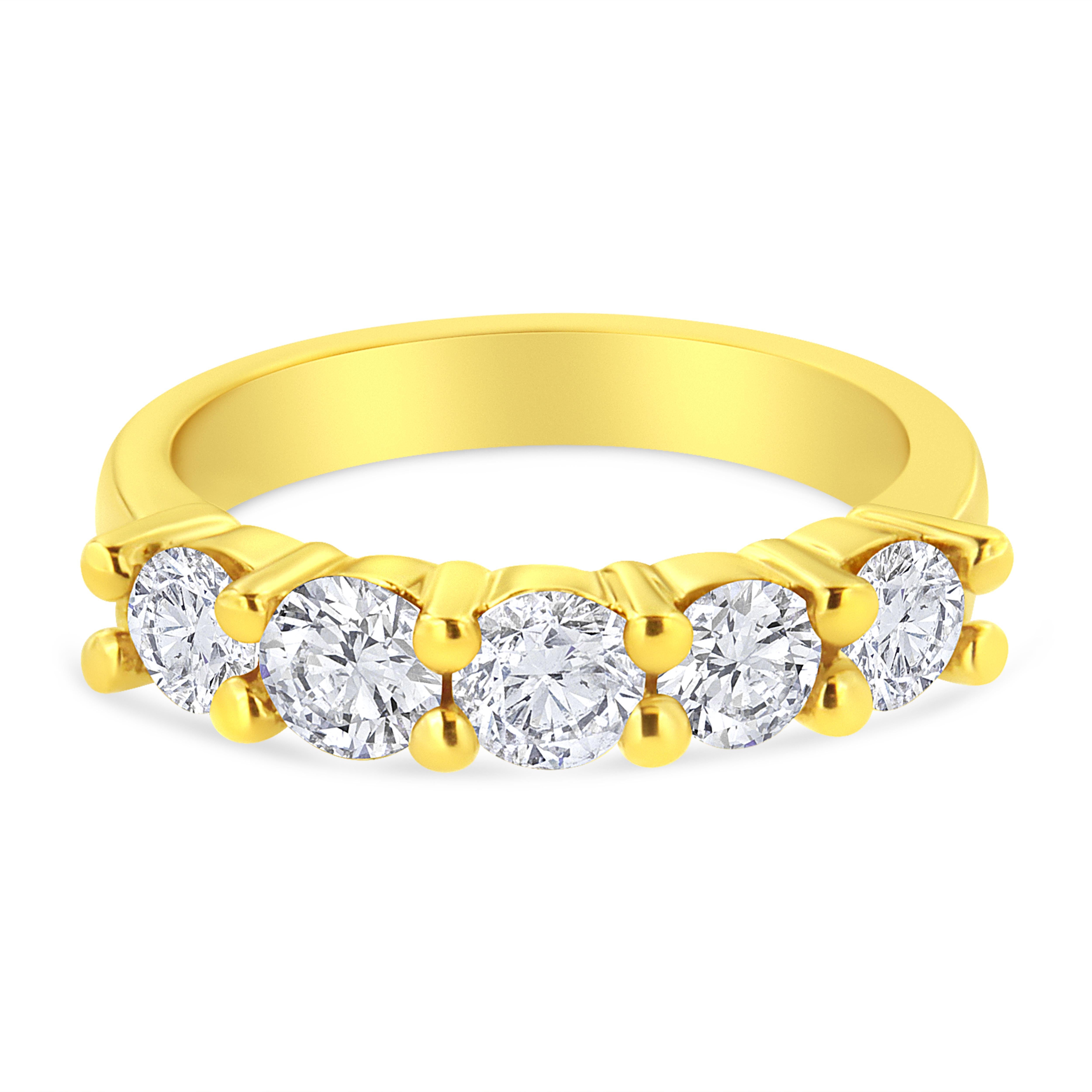Classic and elegant, this 14k yellow gold plated sterling silver ring is a must have piece. 5 dazzling round cut diamonds in a prong setting line the top of a warm yellow gold band. 1 1/2ct TDW of diamonds are showcased in this ring.

Product