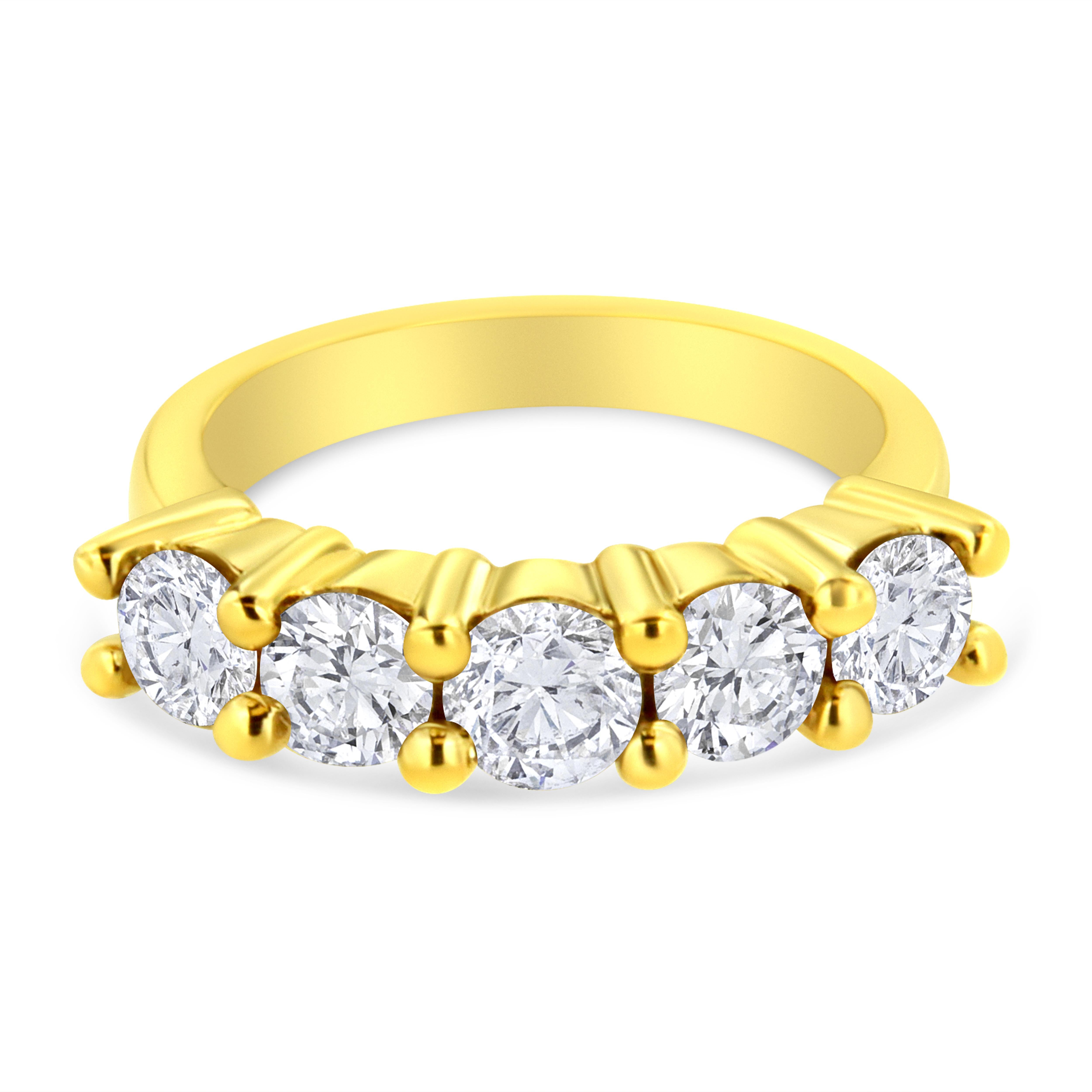 The Eternal five-stone diamond ring is just that, a timeless design that symbolizes a lasting love. Five round brilliant-cut diamonds weighing approximately 2-carat total weight sit securely in shared prongs spanning across the top of the ring. This