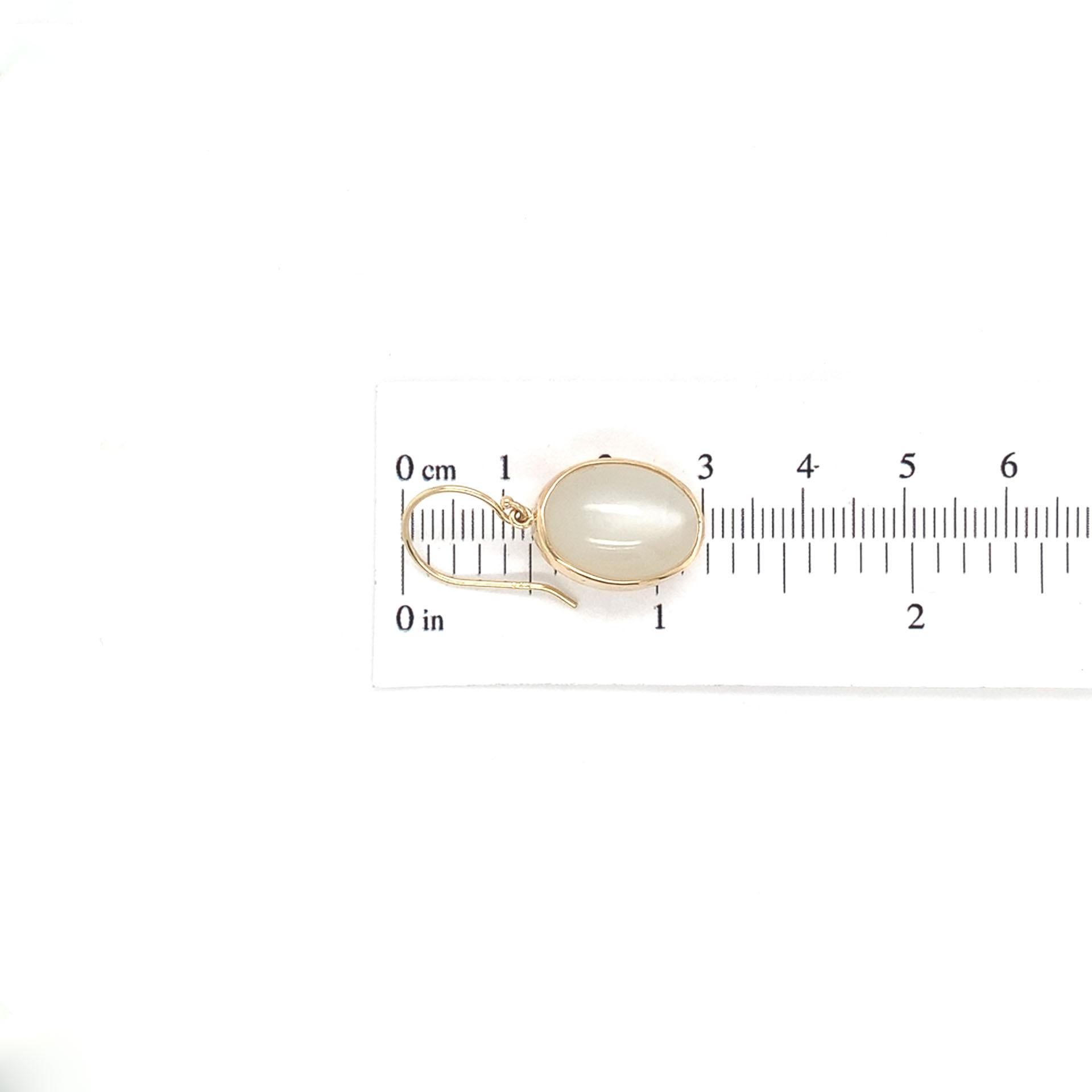 Coppia di orecchini a goccia in oro giallo 14K con pietra di luna grande 22 carati tw in vendita 1