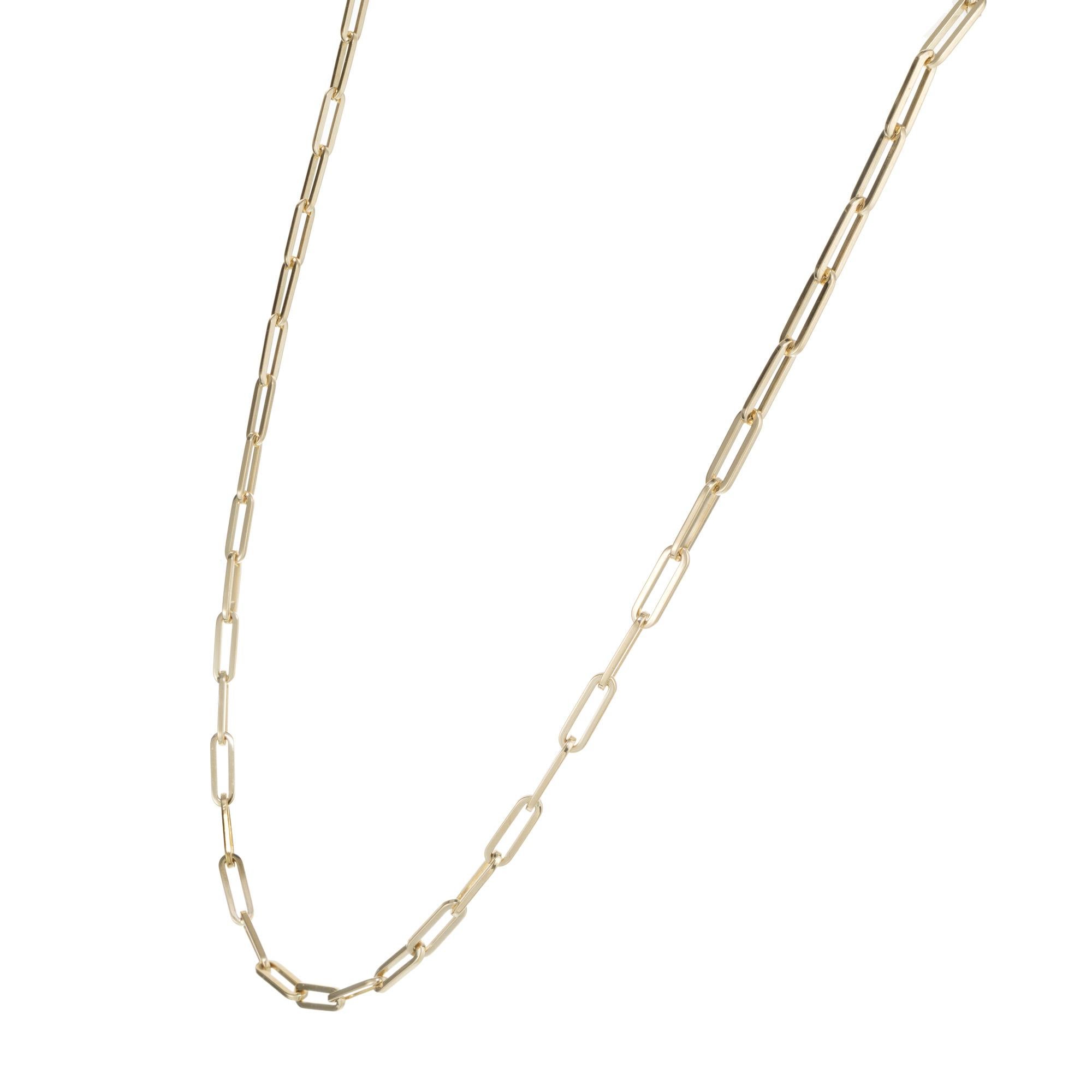 14k yellow gold Paper Clip link necklace. 18 inches in length. 

18k yellow gold
Length: 18 inches
Weight: 14.5 grams
