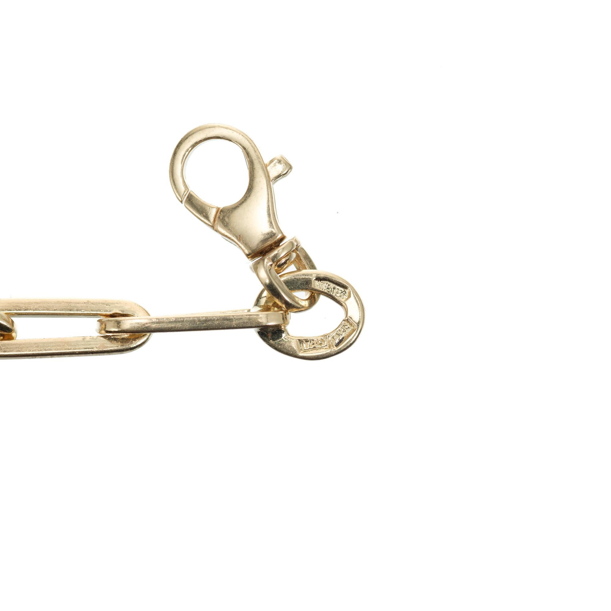 gold paper clip holder