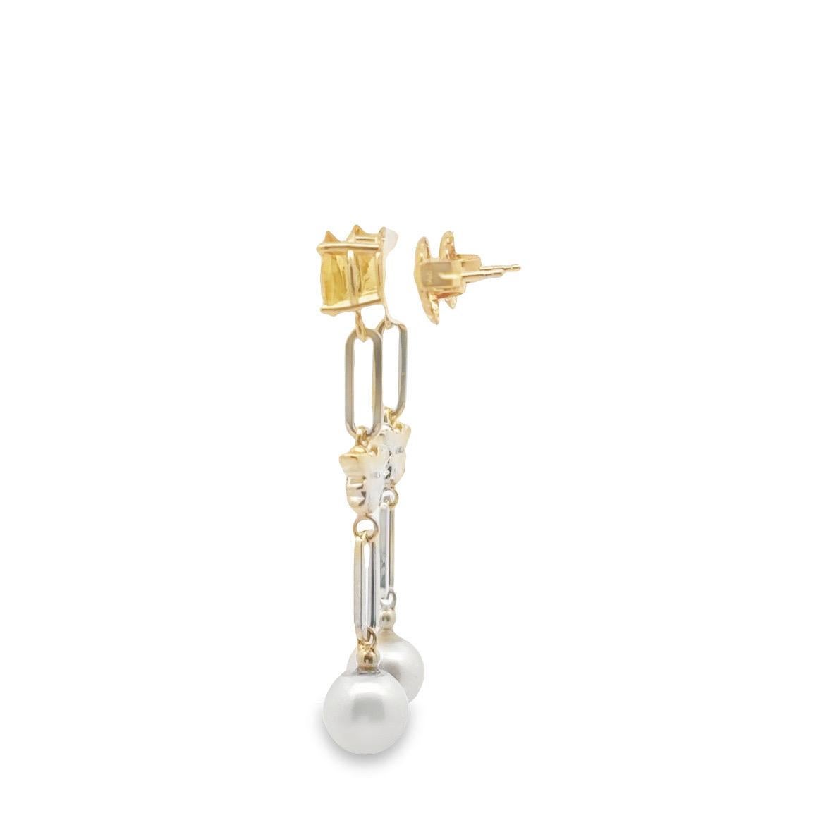Pair 14K yellow gold paperclip dangling earrings with two pear shaped citrines, two bumble bee charms  and two 7mm cultured pearls.

- Post Pushbacks
- Citrines weigh 1.13 carats total 
- Pearls measure 7mm each
- Bee charms are furnished with