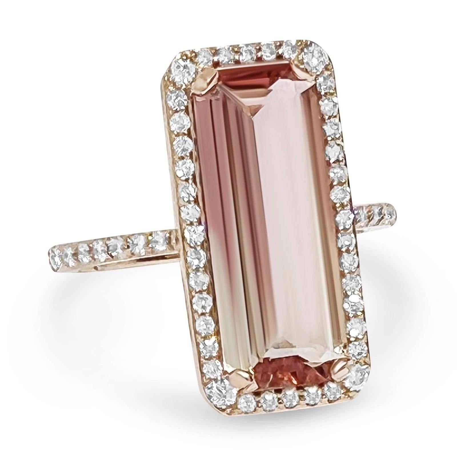 Special extra elongated parti-colored natural tourmaline ring designed with a lab-grown diamond halo. The beautiful center stone weighs 4.30 carats, gradually ombres from soft pink to warm golden yellow, with minor natural inclusions. The mounting