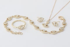 14k Yellow Gold Pavé 2.2 Carat Diamond Eye Tennis Bracelet