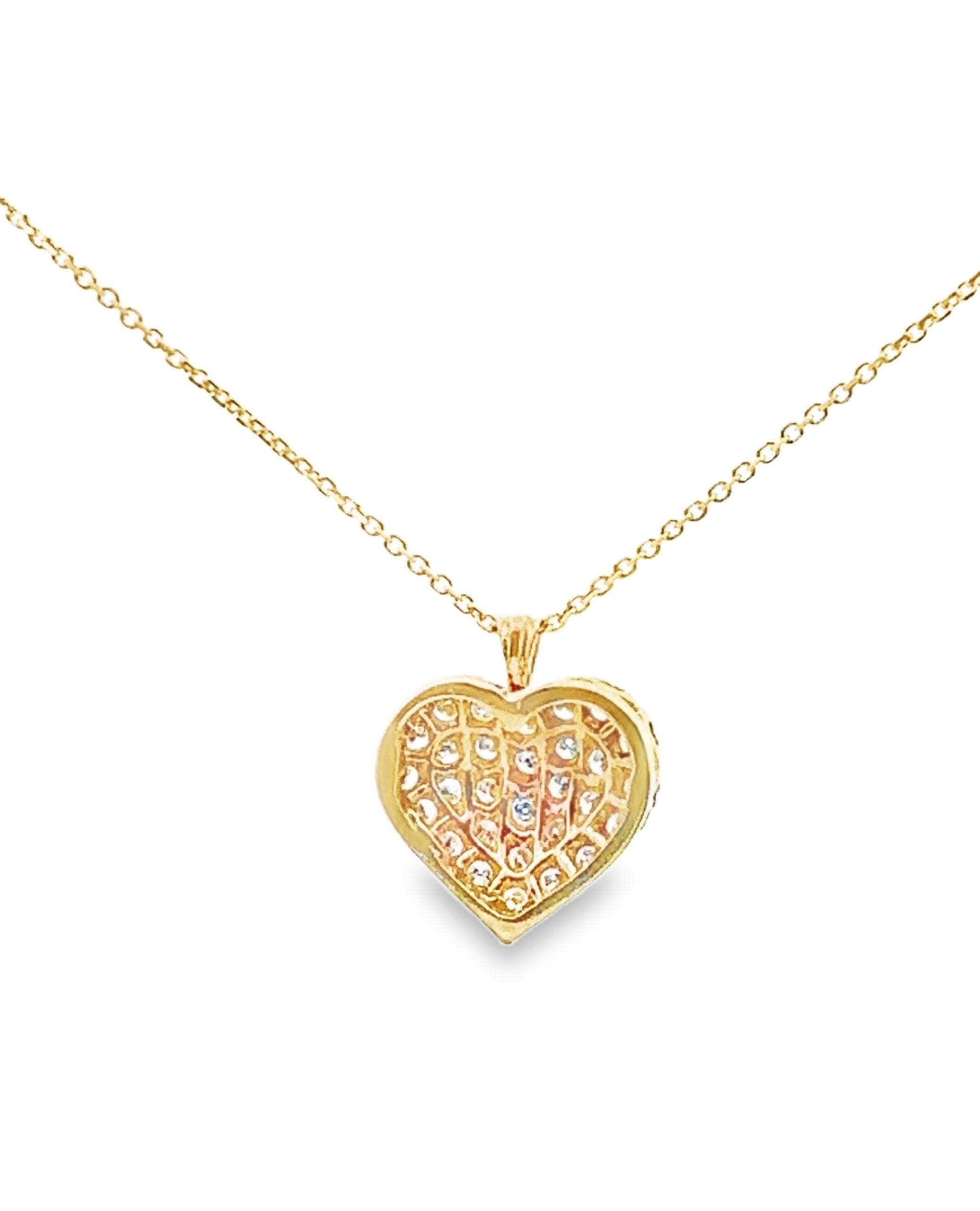 Pre-Owned 14K yellow gold pave heart pendant necklace with 27 round faceted diamonds weighing approximately 0.80 ct total.  The pendant slides on a 14K yellow gold 18 inch cable chain.

*Diamonds are I/J color, SI clarity
* Lobster lock closer