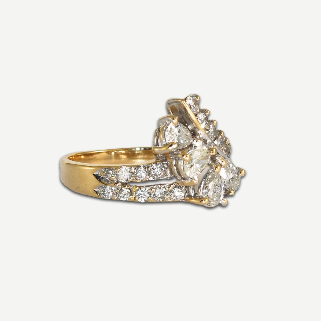 14k Yellow Gold Diamond Ring with 1.00tdw.
There are four pear-shaped diamonds with .80tdw, All SI1-SI2 clarity, three are G-H color, and one is L-M.
Also set with RBC accent Diamonds .20tdw. 
Weighs 3.3 grams.
Size 6, can be sized up or down for an