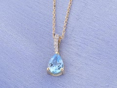 14K Yellow Gold Pear Cut Swiss Blue Topaz and Diamond Drop Pendant Necklace
