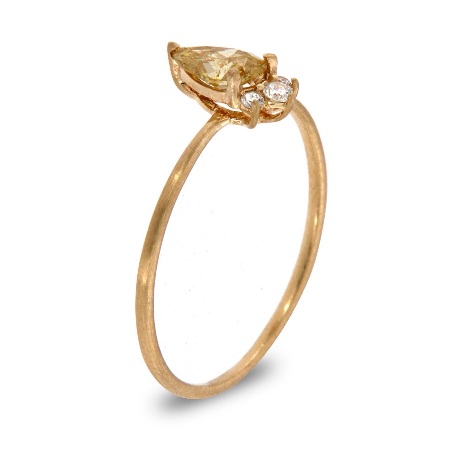 This petite fashion ring is impressive in its vintage appeal, featuring a natural fancy intense yellow pear shaped diamond, accented with round brilliant diamonds. Experience the difference in person!

Product details: 

Center Gemstone Type: