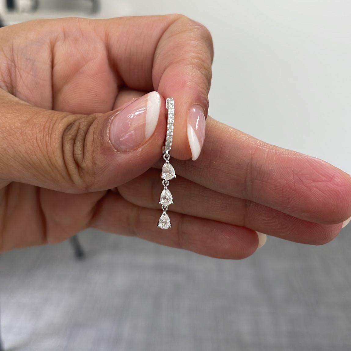 Quality Diamond Huggies: Made from real 14k gold and  glittering natural white approximately 1 ct.  diamonds, featuring Pear-shaped white diamonds on the earrings with a color and clarity of GH-SI.   
 Surprise Your Loved One with Our Diamond Inside