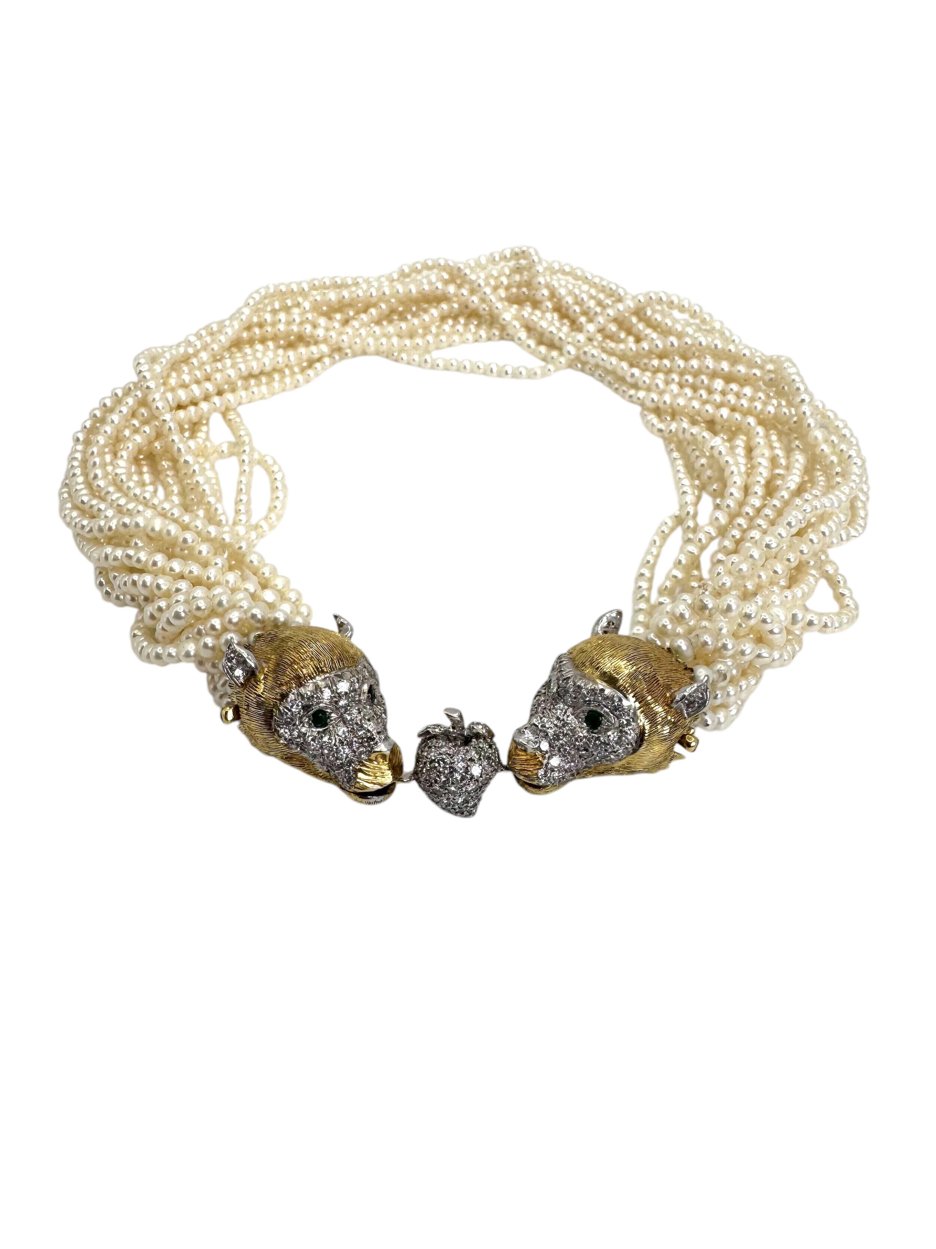 A bold statement piece blending classic elegance with regal strength, this vintage necklace features multiple strands of lustrous cultured pearls joined by a striking lion head clasp. Crafted in solid 14K yellow gold, the twin lions are richly