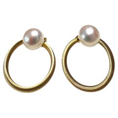 Orecchini a cerchio con anello flessibile e perla in oro giallo 14 carati #25566