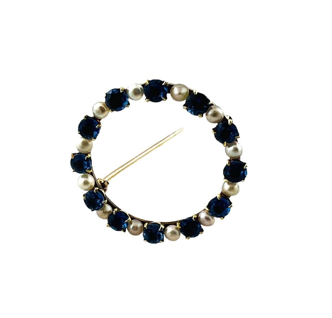 Vintage 14K Yellow Gold Pearl & Natural Blue Sapphire Circle Brooch

This beautiful circle brooch features 12 gorgeous round cut natural blue sapphires and 12 white off round pearls!

Pearls: Approx. 1.6mm each

Sapphires measure 3.52mm X 3.47mm X
