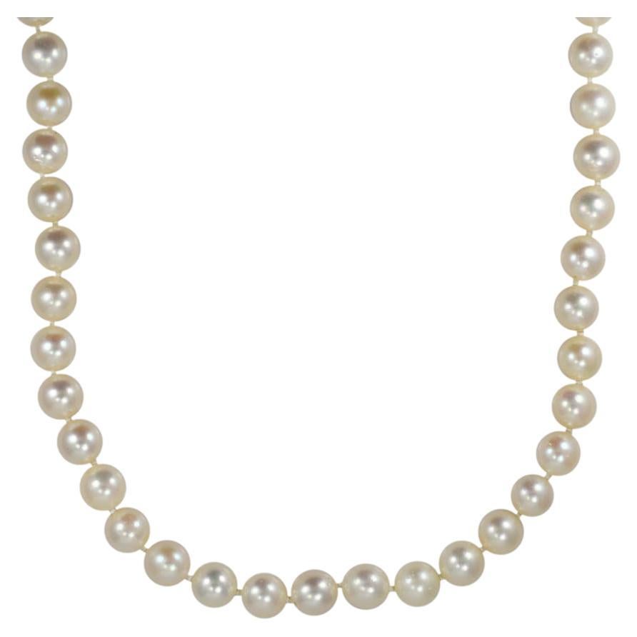 Collier de perles en or jaune 14K 22". en vente