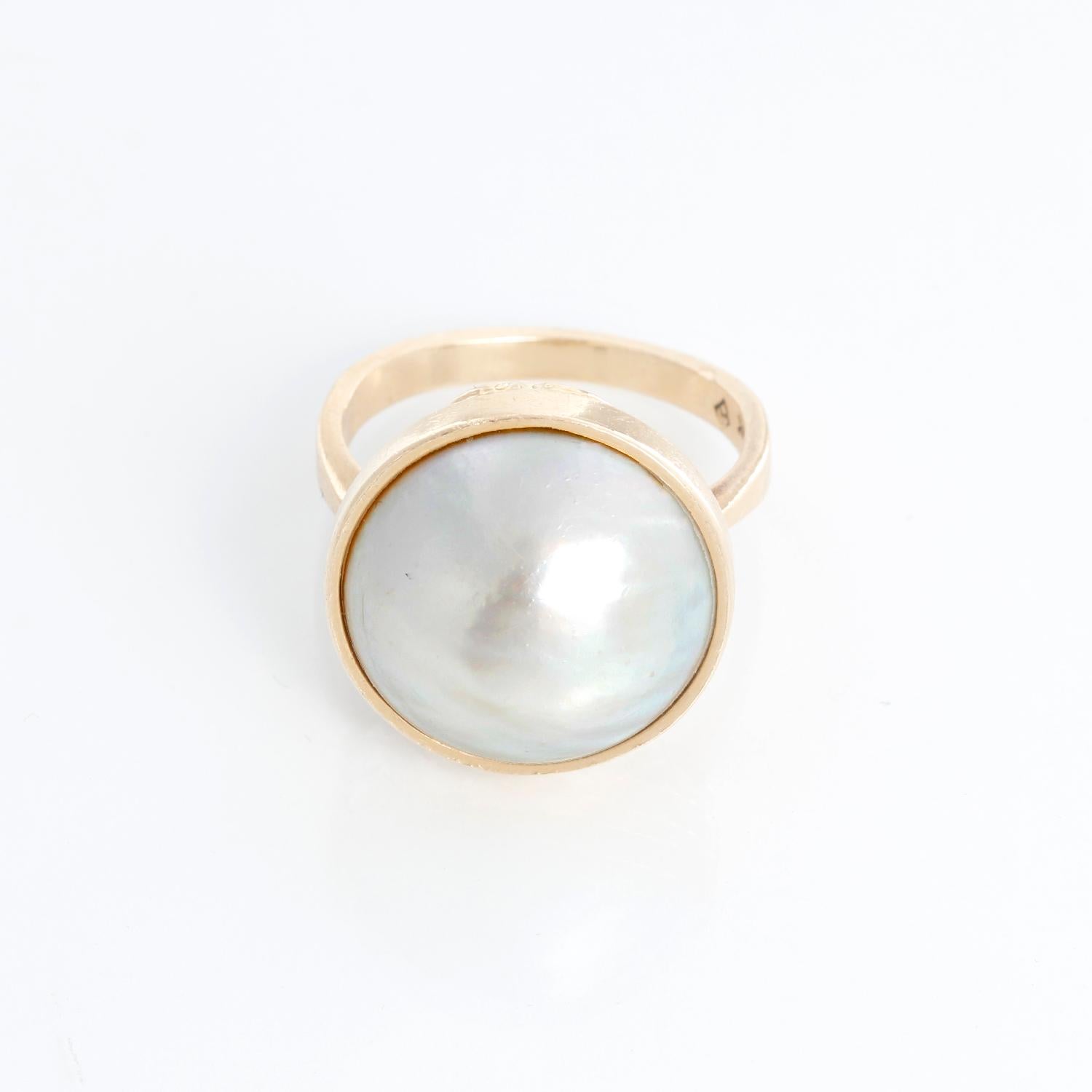 14K Yellow Gold Pearl Ring Size 7 - Cabochon pearl ring set on 14K yellow gold with intricate design on the side. Pre-owned with pouch.