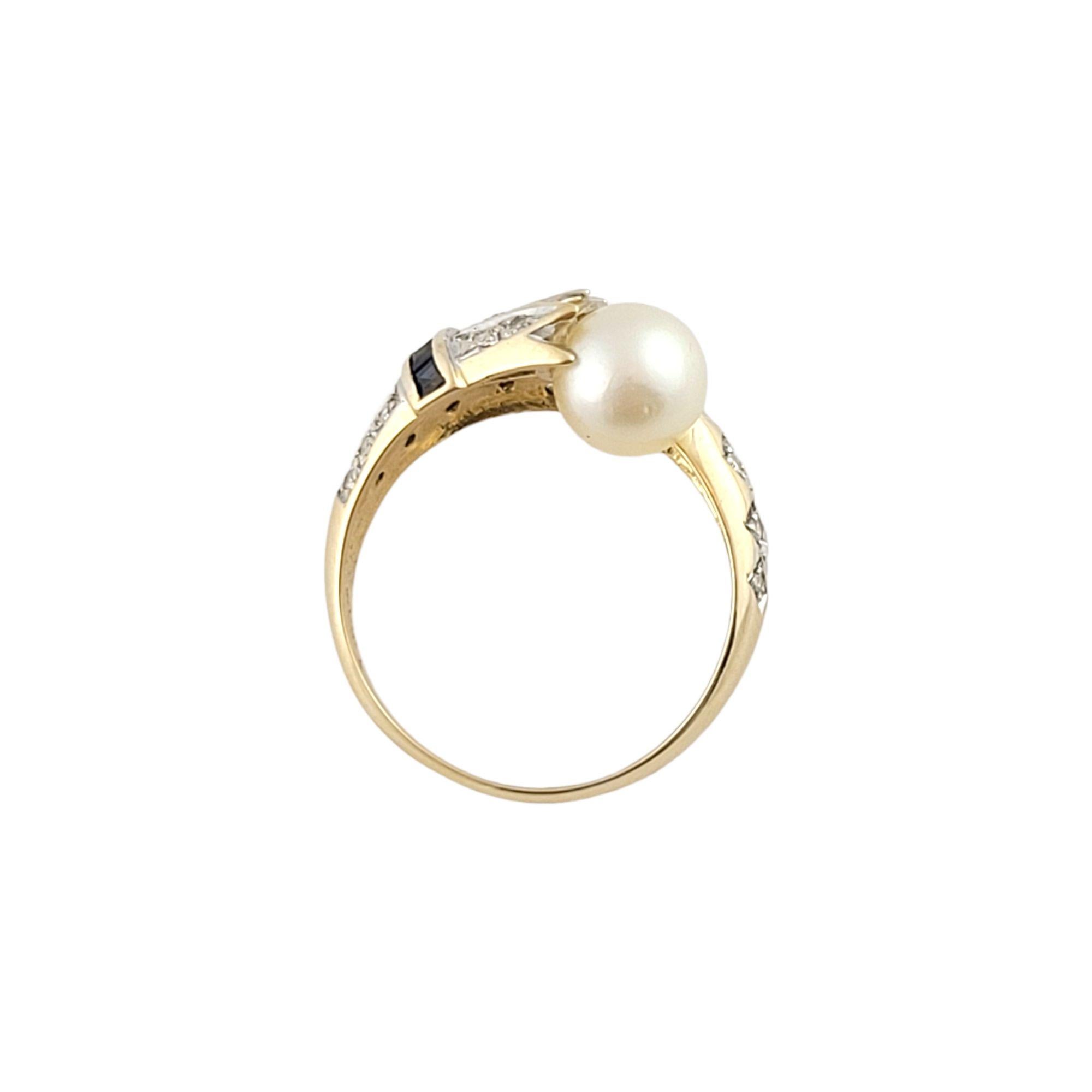 Vintage 14K Yellow Gold Pearl Ring w/ Sapphires and Diamonds Size 5.75

Gorgeous pearl set in a 14K yellow gold ring surrounded by 34 sparkling single cut diamonds and 4 beautiful blue sapphires!

Pearl size: 7mm

Approximate total diamond weight: