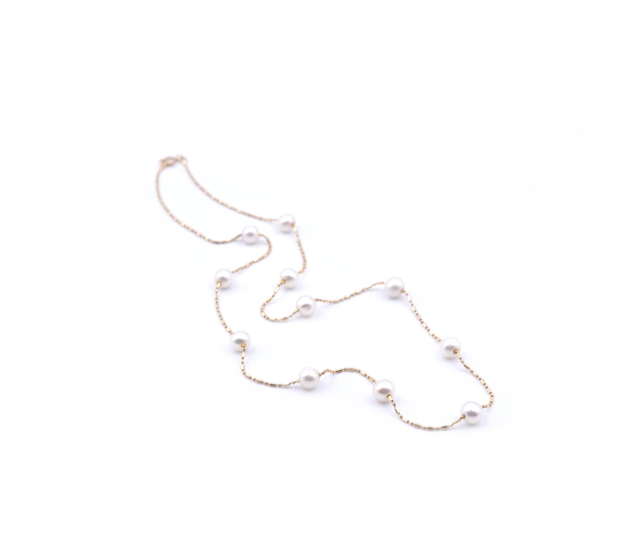 Collier station en or jaune 14 carats et perles Unisexe en vente