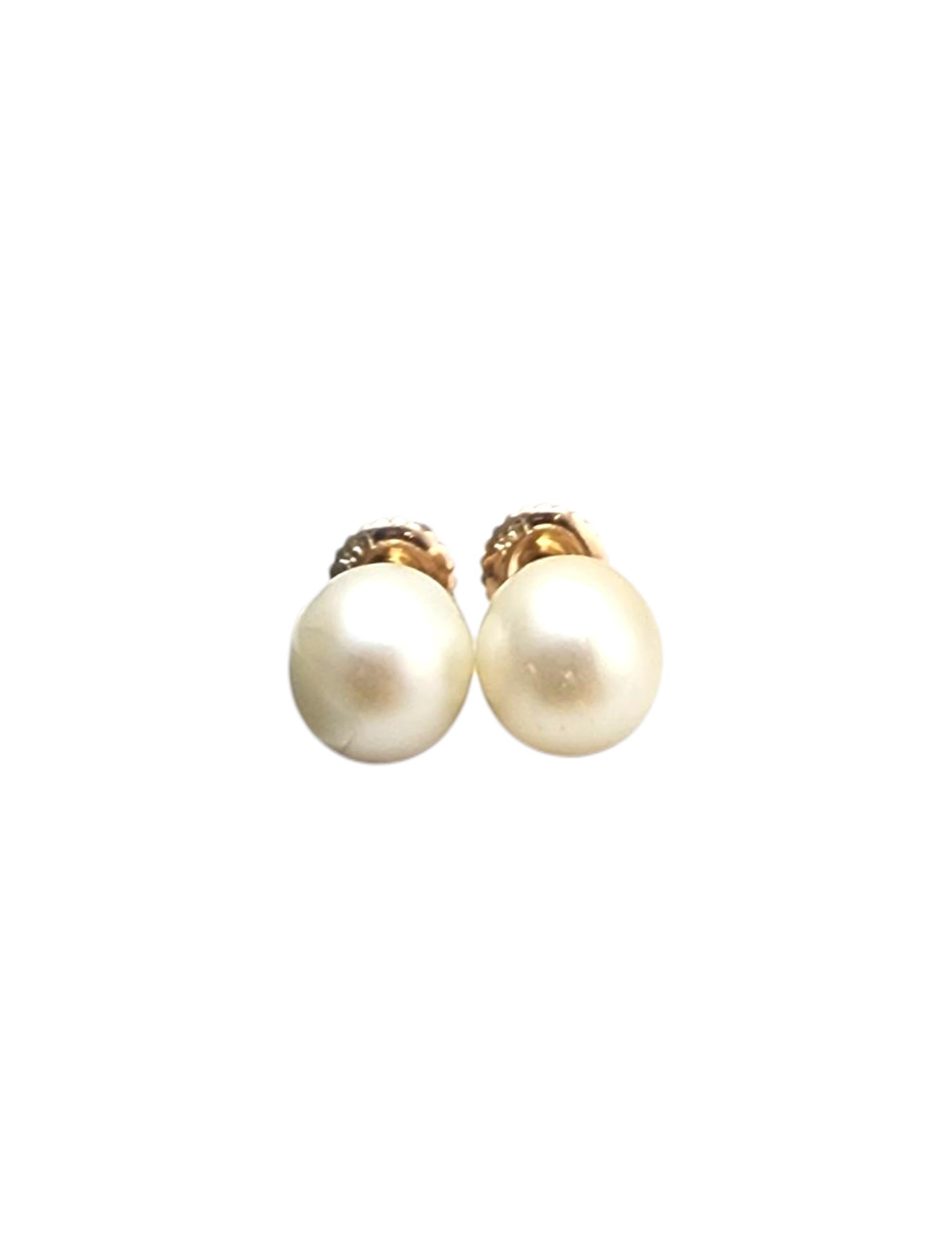 14K Yellow Gold Pearl Studs -

Secure and sophisticated, these pearl stud earrings feature lustrous cultured pearls set in 14K yellow gold with screw backs for added comfort and peace of mind—perfect for everyday elegance.

Weight: 2.1 gr. / 1.4