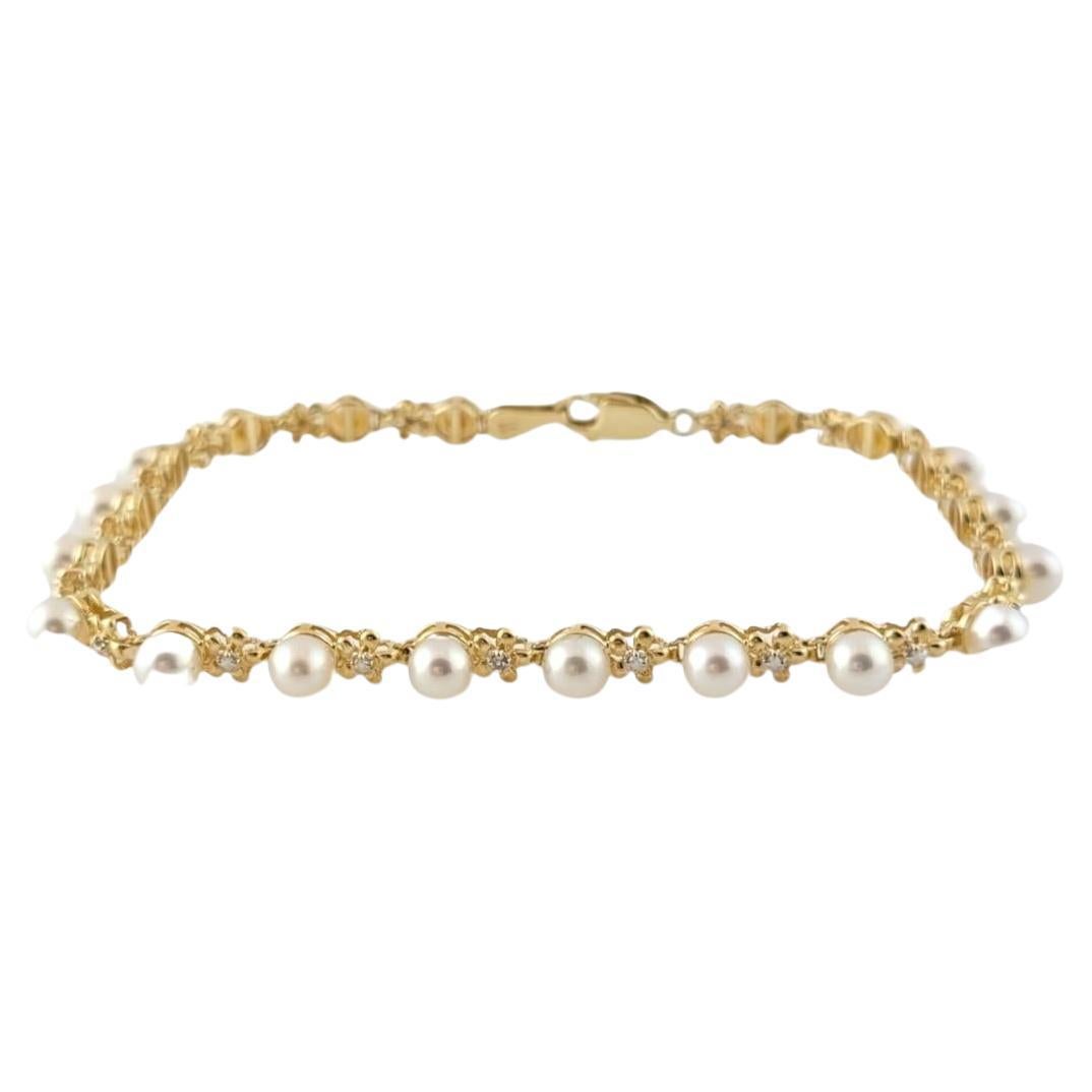 14K Yellow Gold Pearl Tennis Bracelet #15200 For Sale
