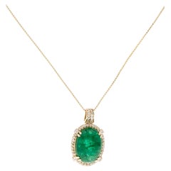 14K Yellow Gold Pendant Necklace Featuring 9.27ct Emerald, Sapphire 
Diamond