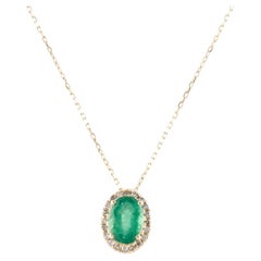14K Yellow Gold Pendant Necklace with 0.73 Carat Oval Modified Brilliant Emerald