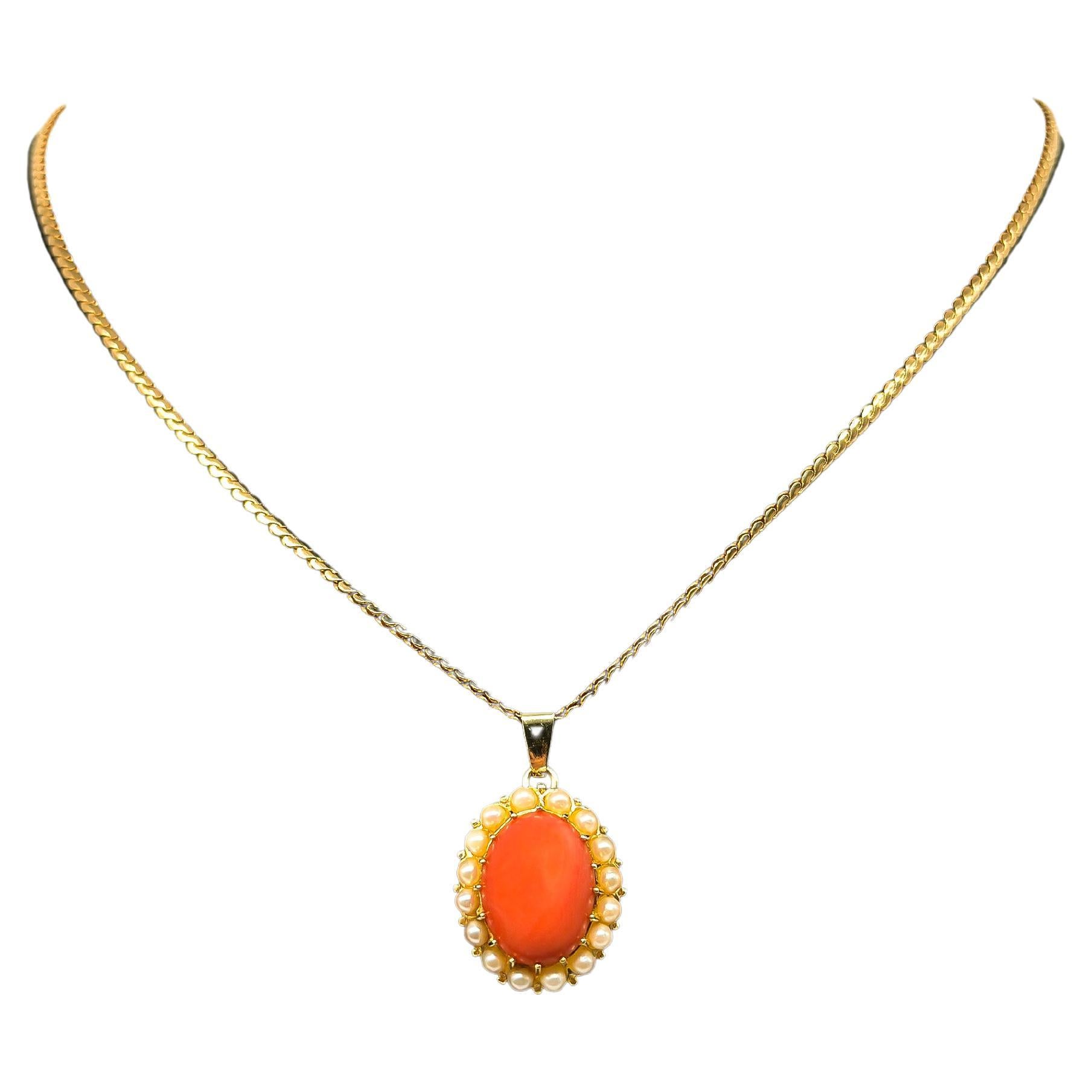 14K yellow gold pendant set with coral and pearls
