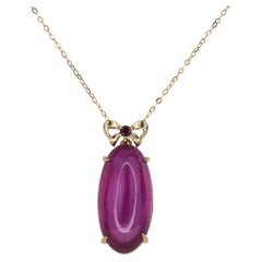 14k Yellow Gold Pendant with Oval Cabochon Ruby and Pink Sapphire