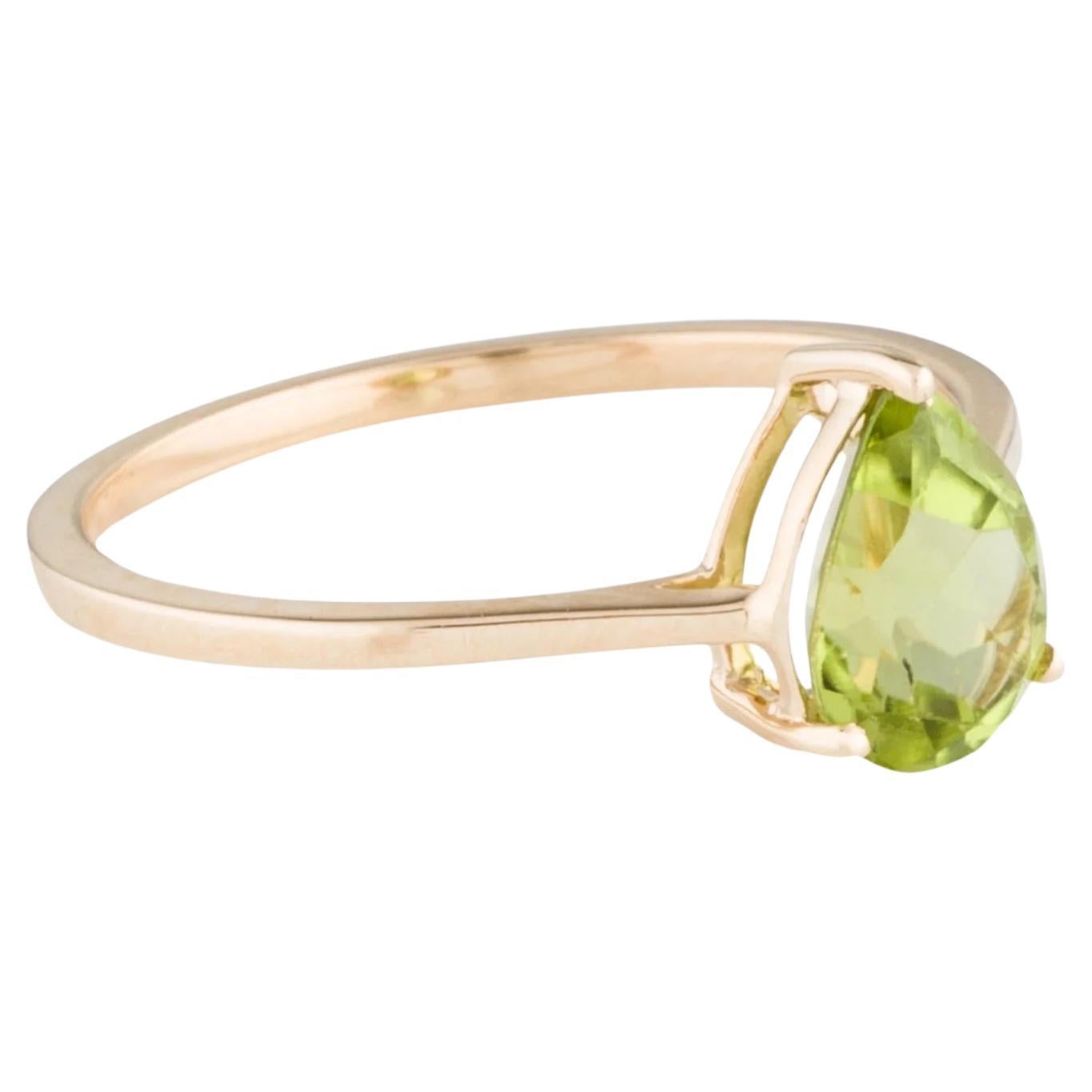 Description:
Elevate your jewelry collection with this stunning 14K Yellow Gold Peridot Cocktail Ring. Crafted to perfection, it features a captivating Pear Modified Brilliant Peridot, exuding timeless elegance. The exquisite design is complemented