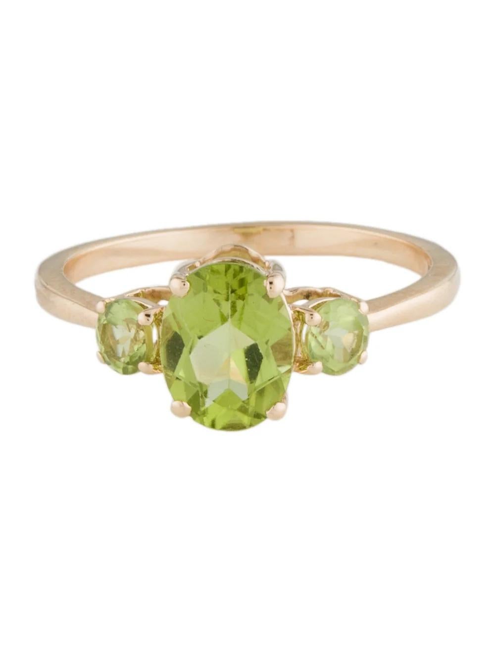 Oval Cut 14K Yellow Gold Peridot Cocktail Ring, Size 7: Vibrant Green Gemstone Jewelry For Sale