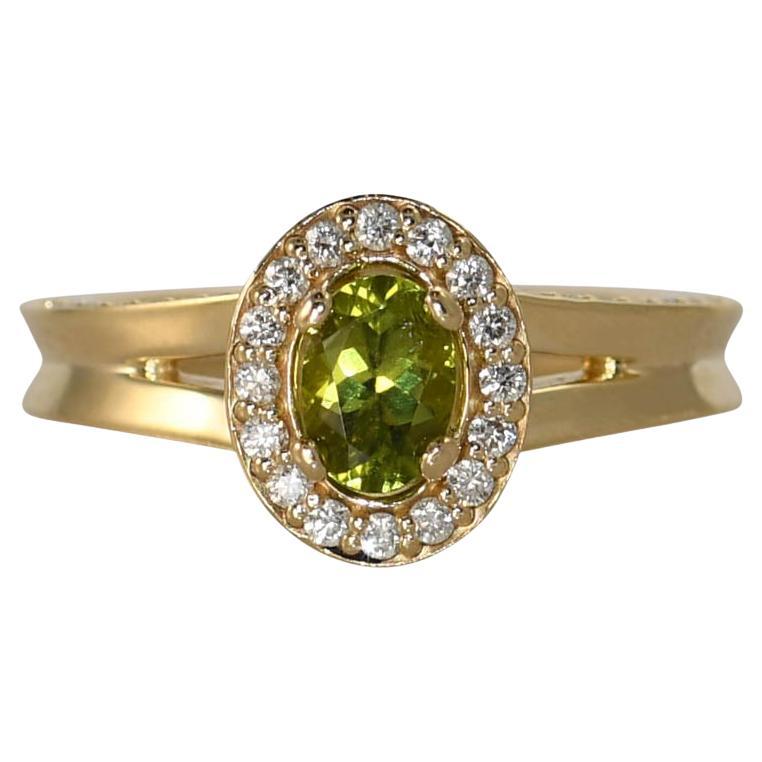 Bague en or jaune 14K avec péridot et diamant 8.2g