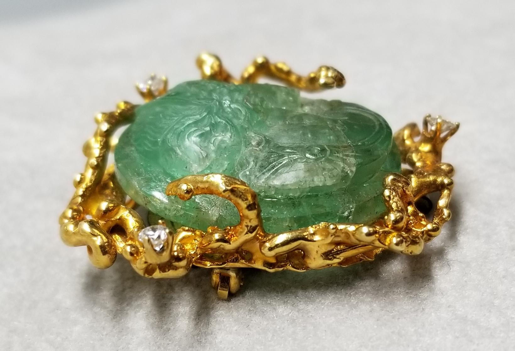 Contemporary 14 Karat Yellow Gold Pin/Pendant with a Hand Carved Emerald with Diamonds