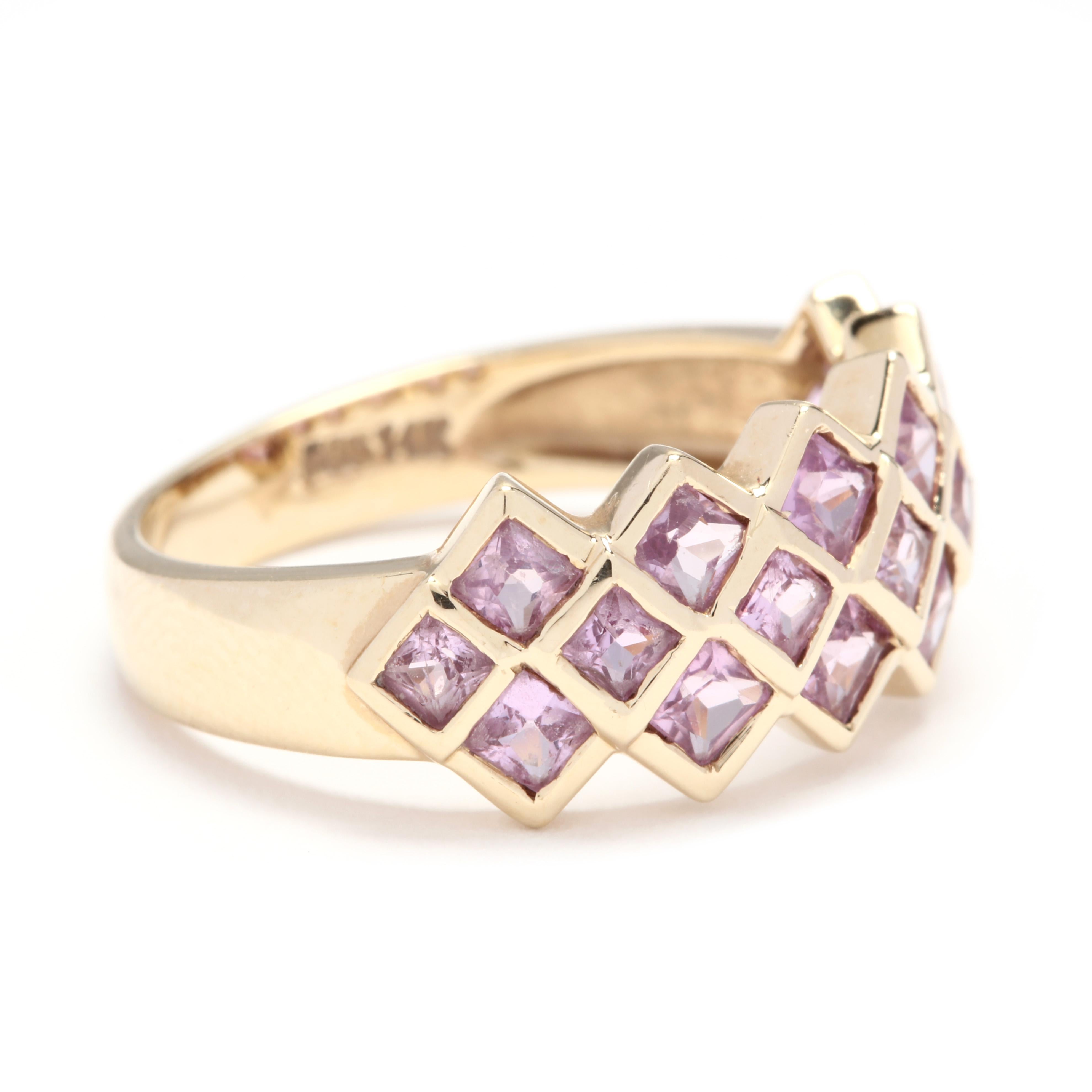 14k yellow gold pink topaz three row band ring. A unique, wide band consisting of three rows of bezel set, square pink topaz. They range from 2 to 2.5mm and weigh approximately 2 total carats. Funky and a little modern this band is a great statement