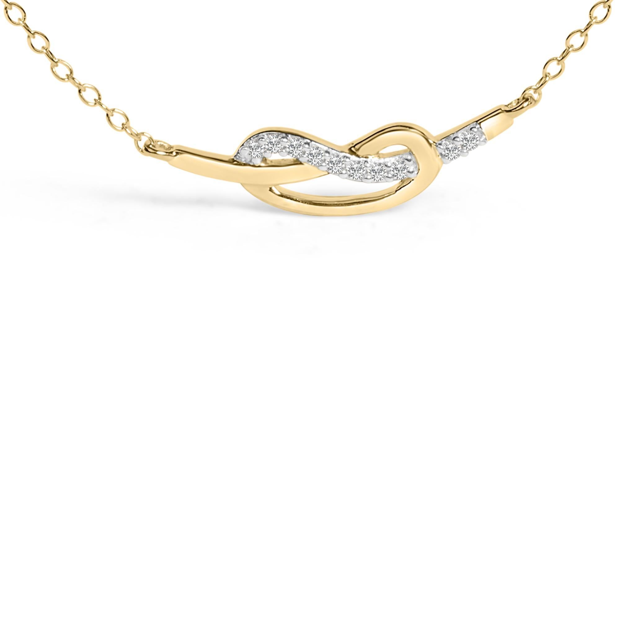 Eleganza eterna con questa squisita collana con ciondolo a forma di nastro dell'infinito, realizzata con maestria in argento 925 e impreziosita da una placcatura in oro giallo 14K. Ogni curva del nastro è stata progettata meticolosamente per