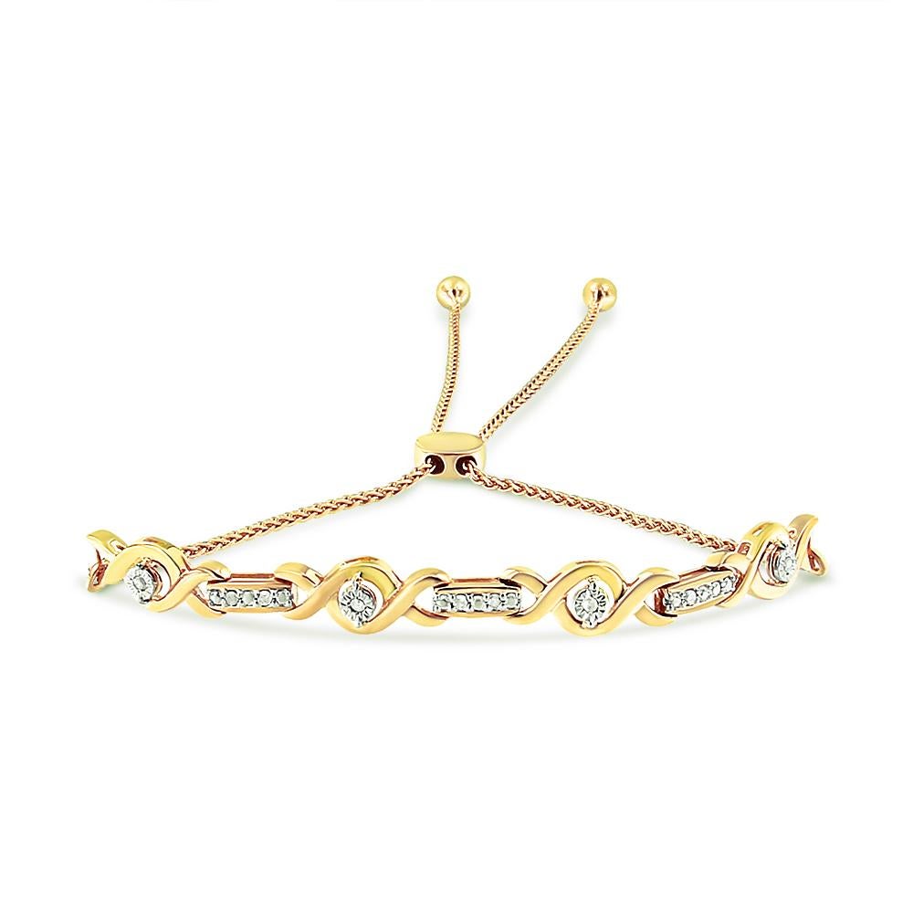 Assuré de créer un look sophistiqué avec n'importe quelle tenue, cet élégant bracelet bolo en diamant est composé d'argent sterling .925 plaqué d'or jaune 14k. Il comporte des maillons infinis en or jaune. Les maillons à l'infini entourent des