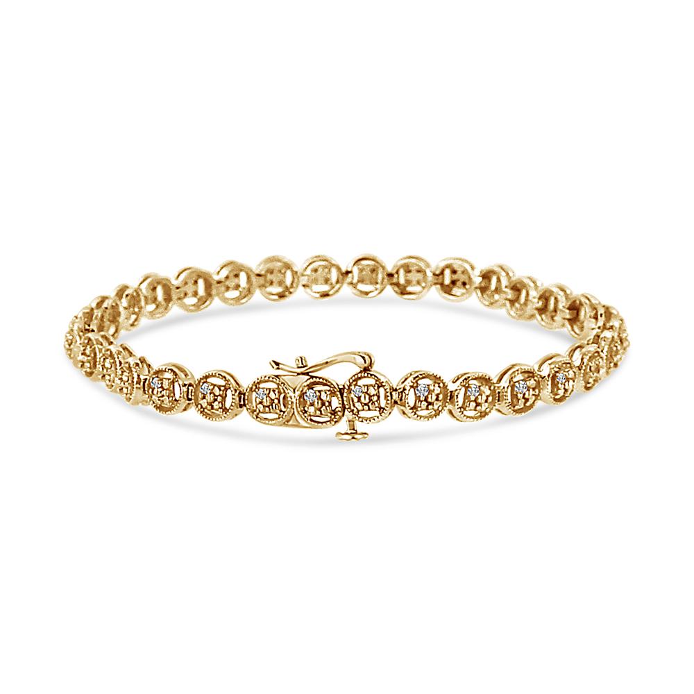 Grace your wrist with the timeless allure of our 14K Yellow Gold-Plated Sterling Silver Tennis Bracelet. Adorned with 17 natural diamonds, the embodiment of elegance, it delicately combines baguette and princess-cut stones. Each diamond, with I-J