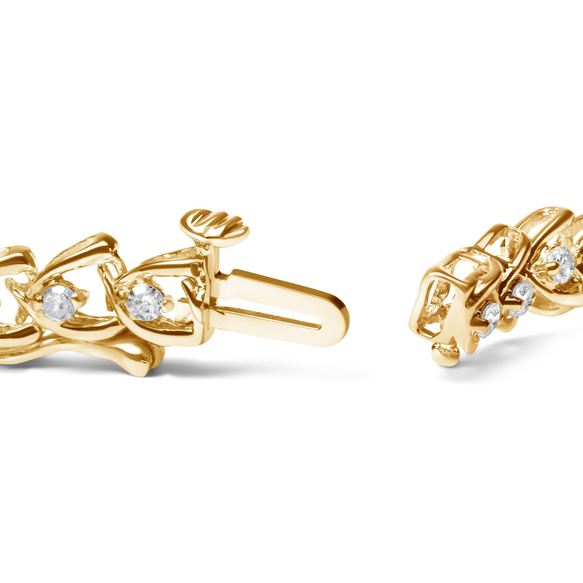 Ornez votre poignet d'une étincelante démonstration de sophistication et d'élégance. Fabriqué en argent sterling .925 plaqué or jaune 14 carats, ce superbe bracelet est orné de 42 diamants ronds étincelants, d'un poids total de 1 carat. Les diamants