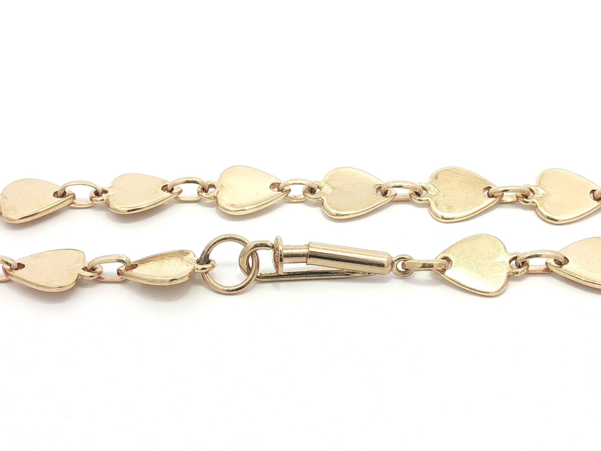 MATERIAL : Or jaune 14k massif 
Poids : 18,81 grammes
Type de chaîne : Maillon plat en forme de cœur 
Longueur de la chaîne : 18 pouces (mesurée à côté de la règle)
Largeur de la chaîne : 6.5mm (0.24