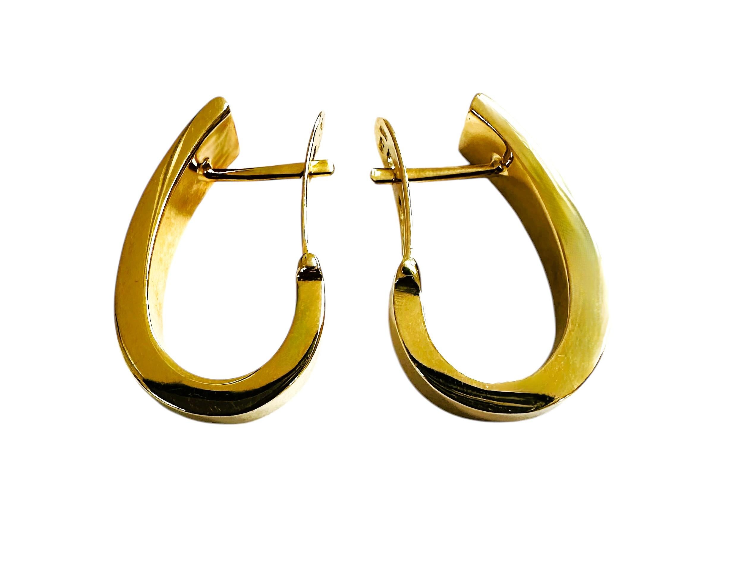These earrings are just beautiful!  They are 14k yellow gold and are high polish earrings.   They are stamped 