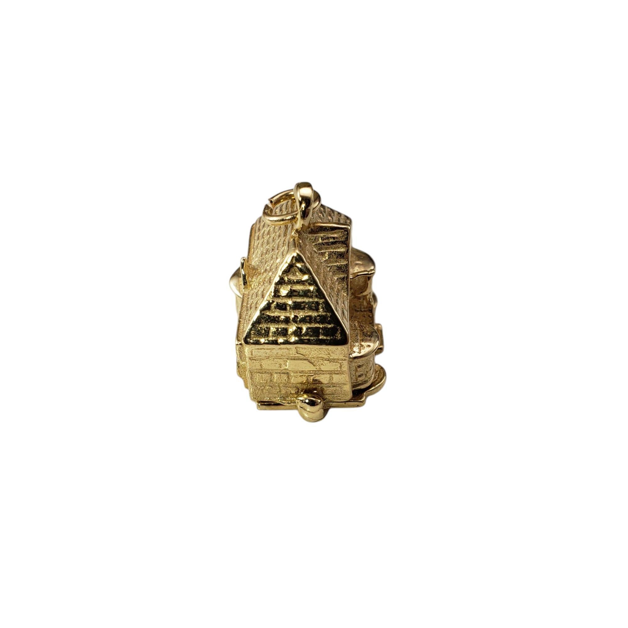 14 Karat Yellow Gold Pot and Piddle Articulating English Pub Charm-

This rare 14K yellow gold charm captures the essence of a traditional English pub, featuring a detailed exterior of a quaint tavern called 